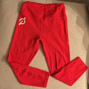 Peloton Women’s Bright Orange Cadent Leggings with netting detail. S NWOT